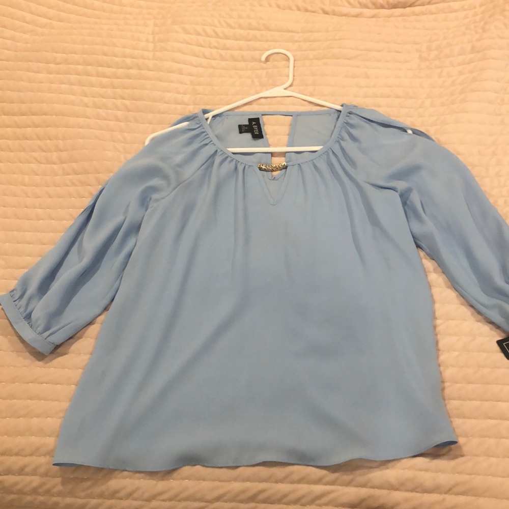 A light blue blouse
